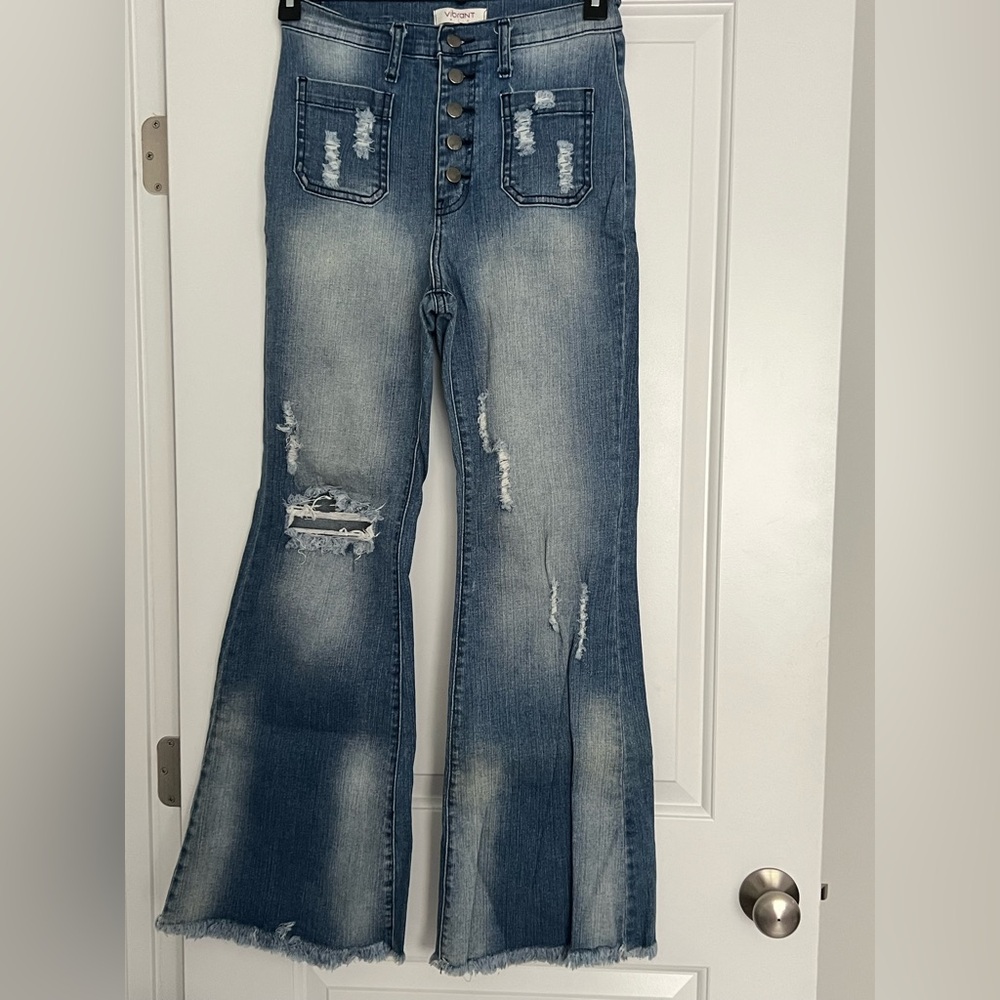 Five button distressed bell bottom jeans